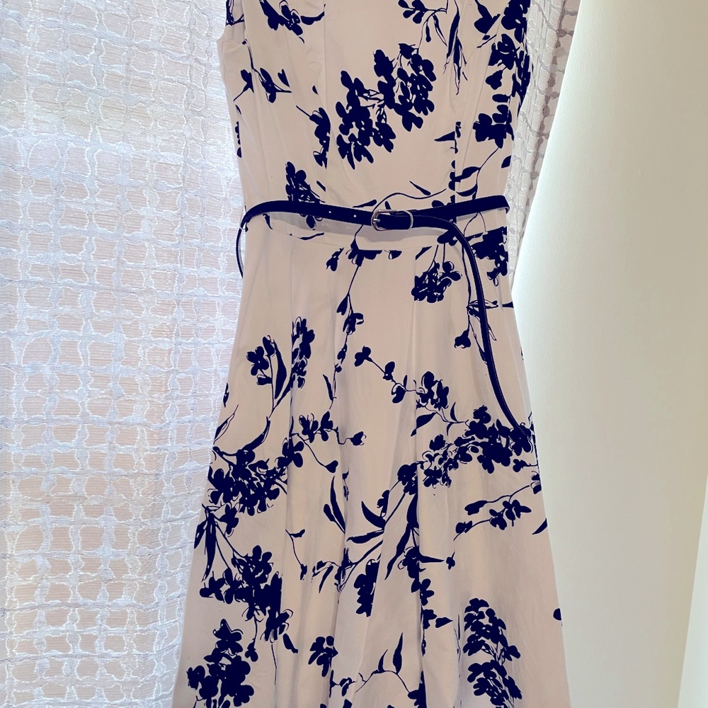 Grace Karin Size S. Black and white flowers with a separate black belt.